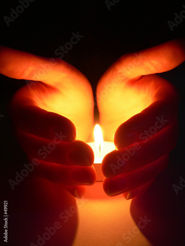 hands and a candle