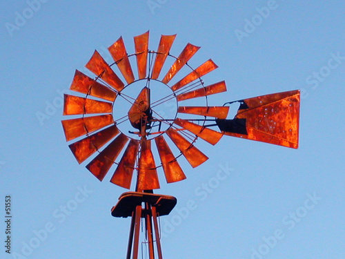 red windmill on blue