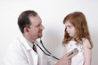 doctor listening to a child's heart