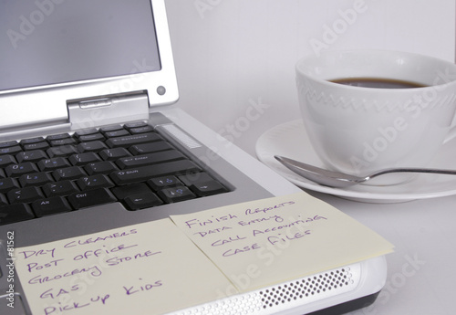 computer with notes and cup of coffee computer with notes and cup of coffee