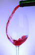 wine being poured -  with colored lighting