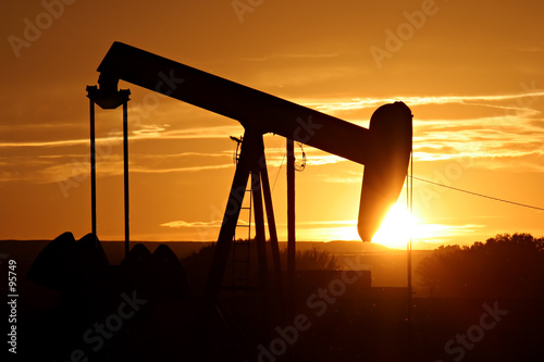 Photo: oil pump against setting sun oil pump against setting sun