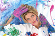 beautiful young woman covered in paint