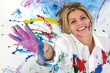 beautiful young woman covered in paint