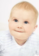 infant with fair hair and blue eyes