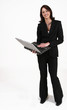 businesswoman standing while working on her computer