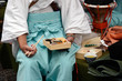 japanese man in kimono eating bento japanese man in kimono eating bento