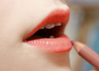 applying lipstick