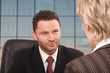 white business man and woman talk
