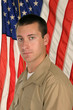 guy in front of flag guy in front of flag