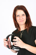woman removing headset woman removing headset