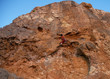 climber reaching the peak