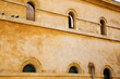 rustic wall with arched windows