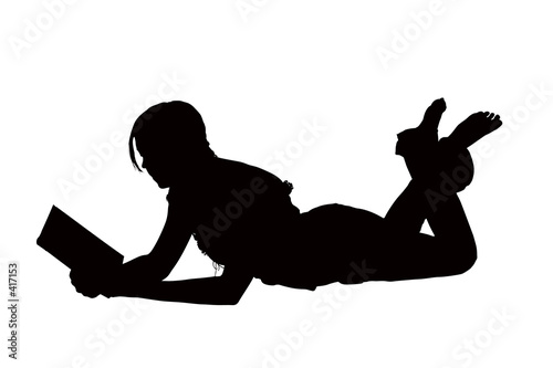 silhouette with clipping path of woman reading boo silhouette with clipping path of woman reading boo