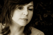 sepia portrait of a sad woman