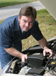 handsome mechanic under hood