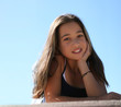asian teen girl against the sky
