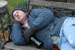 homeless man - on park bench