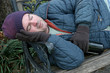 homeless man - park bench closeup