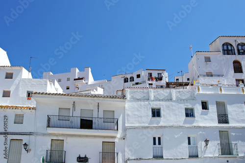 white buildings in traditional spanish pueblo white buildings in traditional spanish pueblo