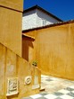 yellow house on hydra island, greece