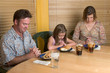 family saying grace 2