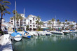 boats and yachts moored in duquesa port in spain on the costa de