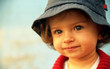 little girl in hat