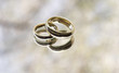wedding rings on a mirror