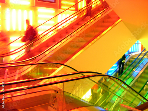 escalators with bright lights