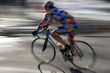 man racing on bicycle