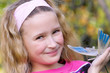 pretty young girl with butterfly