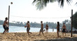 playing beach volley ball