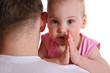 baby on father's shoulder