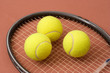 tennis balls and racket