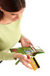 stock photo of a young woman holding credit card