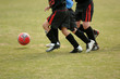 children playing soccer - football