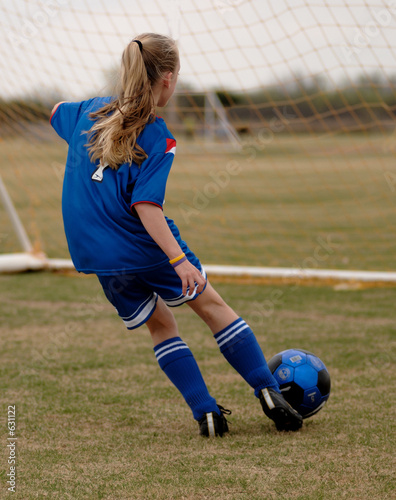 girl playing soccer - football girl playing soccer - football