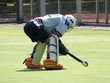 goalkeeper bent over