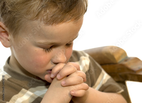 Photo: little boy praying little boy praying