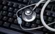 stethoscope on a computer keyboard