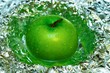 green apple in foil and water