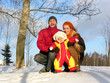 family of three. winter. sun.
