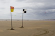 lifeguards flags and kite surfers lifeguards flags and kite surfers