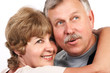 elderly couple smiling.