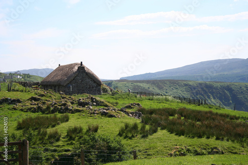 Photo: thatch cottage, isle of skye, scotland thatch cottage, isle of skye, scotland