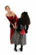 girls in formal dresses with gift