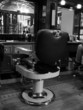 an old fashioned barber's chair an old fashioned barber's chair