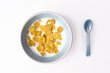 plate of breakfast cereal and spoon