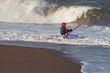 man in blue kayak